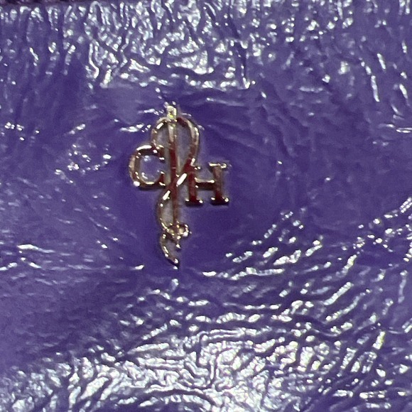 COLE HAAN Jitney II Ziptop Swingpack Crossbody Bag Purple Patent Leather - Picture 2 of 11